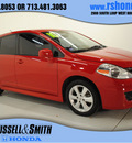 nissan versa 2010 red hatchback 1 8 sl gasoline 4 cylinders front wheel drive automatic with overdrive 77025