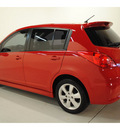 nissan versa 2010 red hatchback 1 8 sl gasoline 4 cylinders front wheel drive automatic with overdrive 77025