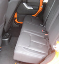 jeep wrangler unlimited 2013 orange suv sahara gasoline 6 cylinders 4 wheel drive 5 speed automatic 62863