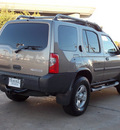 nissan xterra 2004 gray suv se gasoline 6 cylinders rear wheel drive automatic with overdrive 77074