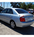 kia spectra 2006 lt  blue sedan ex gasoline 4 cylinders front wheel drive automatic with overdrive 77662