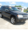 jeep grand cherokee 2004 black suv limited gasoline 8 cylinders rear wheel drive automatic with overdrive 77627