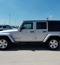 jeep wrangler unlimited 2010 silver suv sahara gasoline 6 cylinders 2 wheel drive automatic with overdrive 77469