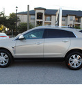 cadillac srx 2010 gold suv luxury collection gasoline 6 cylinders front wheel drive 6 speed automatic 77002
