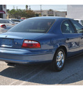mercury sable 2004 blue sedan ls premium gasoline 6 cylinders front wheel drive automatic 78217