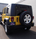 jeep wrangler unlimited 2009 yellow suv x gasoline 6 cylinders 4 wheel drive automatic with overdrive 98371
