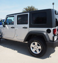 jeep wrangler unlimited 2010 silver suv sport gasoline 6 cylinders 4 wheel drive automatic with overdrive 76018