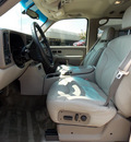 gmc yukon 2002 white suv slt 8 cylinders automatic with overdrive 77074