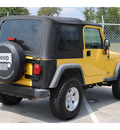 jeep wrangler 2005 yellow suv sport gasoline 6 cylinders 4 wheel drive automatic with overdrive 77338