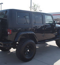jeep wrangler unlimited 2008 black suv sahara gasoline 6 cylinders 2 wheel drive automatic with overdrive 76018