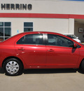 toyota yaris 2009 red sedan gasoline 4 cylinders front wheel drive automatic 75062