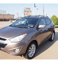 hyundai tucson 2013 bronze limited gasoline 4 cylinders front wheel drive automatic 77074