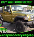 jeep wrangler 2007 green suv x 6 cylinders 6 speed manual 33021