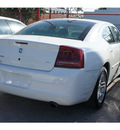 dodge charger 2006 white sedan sxt gasoline 6 cylinders rear wheel drive automatic 77018