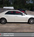 cadillac sts 2005 white sedan gasoline 6 cylinders rear wheel drive automatic 77090