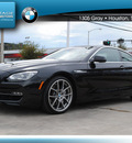 bmw 6 series 2012 black coupe 650i gasoline 8 cylinders rear wheel drive automatic 77002