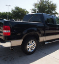 ford f 150 2008 black xlt 8 cylinders automatic with overdrive 76011