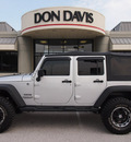 jeep wrangler unlimited 2011 silver suv sport gasoline 6 cylinders 4 wheel drive automatic 76011