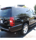 chevrolet suburban 2011 black suv ltz flex fuel 8 cylinders 2 wheel drive automatic with overdrive 77581