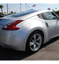 nissan 370z 2011 silver coupe gasoline 6 cylinders rear wheel drive automatic with overdrive 77581