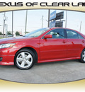 toyota camry 2010 red sedan se v6 gasoline 6 cylinders front wheel drive automatic 77546