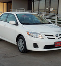 toyota corolla 2011 white sedan le 4 cylinders automatic with overdrive 77074