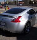 nissan 370z 2009 silver coupe 6 cylinders standard 79925