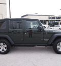 jeep wrangler unlimited 2012 green suv rubicon gasoline 6 cylinders 4 wheel drive 6 speed manual 76011