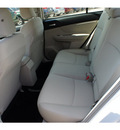 subaru impreza 2013 white sedan 2 0i premium gasoline 4 cylinders all whee drive automatic 77099