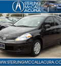 nissan versa 2011 black hatchback 1 8 s 4 cylinders automatic with overdrive 77074