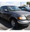 ford f 150 2002 dk  gray supercrew gasoline 8 cylinders rear wheel drive automatic with overdrive 77581