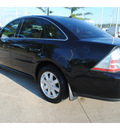 ford taurus 2009 black sedan se gasoline 6 cylinders front wheel drive automatic with overdrive 77539