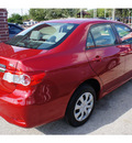 toyota corolla 2011 red sedan le gasoline 4 cylinders front wheel drive automatic 78748