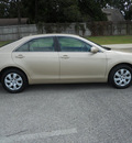 toyota camry 2011 tan sedan le gasoline 4 cylinders front wheel drive automatic 75604