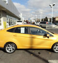 ford fiesta 2011 orange sedan sel gasoline 4 cylinders front wheel drive automatic with overdrive 60546