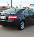 toyota camry 2011 black sedan le gasoline 4 cylinders front wheel drive automatic with overdrive 77074