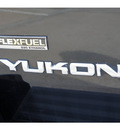 gmc yukon 2009 black suv slt flex fuel 8 cylinders 2 wheel drive automatic 77094