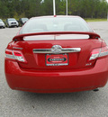 toyota camry 2010 red sedan xle 4 cylinders automatic 75604