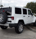 jeep wrangler unlimited 2013 white suv sahara 6 cylinders automatic with overdrive 77099