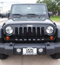 jeep wrangler 2012 black suv sport gasoline 6 cylinders 4 wheel drive automatic 76011