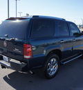 cadillac escalade 2006 blue suv gasoline 8 cylinders all whee drive 4 speed automatic 76087