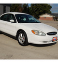 ford taurus 2003 white sedan ses 6 cylinders automatic with overdrive 77706