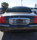 lincoln town car 2005 brown sedan signature gasoline 8 cylinders rear wheel drive automatic with overdrive 76087