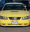 ford mustang 2002 yellow coupe 6 cylinders automatic with overdrive 77074