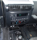 jeep wrangler 2005 blue suv sport gasoline 6 cylinders 4 wheel drive 6 speed manual 98371