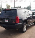 gmc yukon 2009 blue suv slt gasoline 8 cylinders 2 wheel drive automatic with overdrive 77657