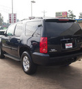 gmc yukon 2009 blue suv slt gasoline 8 cylinders 2 wheel drive automatic with overdrive 77657