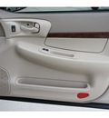chevrolet impala 2003 gold sedan gasoline 6 cylinders front wheel drive automatic 77043