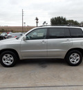 toyota highlander 2004 silver suv 6 cylinders automatic with overdrive 77477