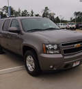 chevrolet suburban 2012 brown suv lt 1500 flex fuel 8 cylinders 2 wheel drive automatic with overdrive 77656